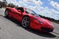 Red Ferrari with mirror paint on a track in Florida Royalty Free Stock Photo