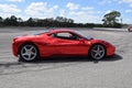 Red Ferrari with mirror paint on a track in Florida Royalty Free Stock Photo