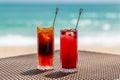 Exotic Colorful Cocktails on Table at Sea Shore, Summer Vacations Concept Royalty Free Stock Photo