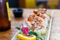 Exotic crab stick sushi roll plate with breaded prawn Royalty Free Stock Photo