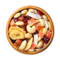 Exotic dried fruit mix with nuts, trail mix and snack food in wooden bowl Royalty Free Stock Photo