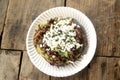 Grasshopper mexican taco, edible insect tortilla toast made with blue corn and filled with guacamole, cheese and coriander from Me