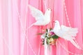 Exotic flowers arrangement over pink and white fab Royalty Free Stock Photo