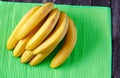 Exotic fresh bananas on wooden background Royalty Free Stock Photo