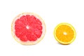 Exotic, fresh and juicy grapefruit slice and ripe, citrus, tasty, bright yellow lemon slice, isolated on a white background. Royalty Free Stock Photo