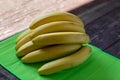 Exotic fresh bananas on wooden background Royalty Free Stock Photo