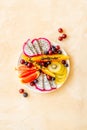 Exotic fruit dish with dragon fruit and papaya, top view Royalty Free Stock Photo