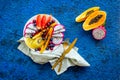 Exotic fruit dish with dragon fruit and papaya, top view Royalty Free Stock Photo