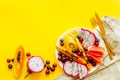 Exotic fruit dish with dragon fruit and papaya, top view Royalty Free Stock Photo