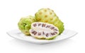 Exotic Fruit, Noni fruits in white plate on white background Royalty Free Stock Photo
