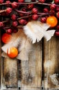 Exotic fruits flowers with candles and feathers Royalty Free Stock Photo