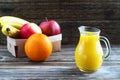 Exotic fruits and juice in glass jug Royalty Free Stock Photo