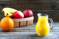 Exotic fruits and juice in glass jug Royalty Free Stock Photo