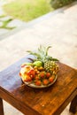 Exotic fruits on plate: mango, dragon fruit; mango; pineapple an Royalty Free Stock Photo