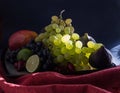Exotic fruits variety still life with grapes, figs, lime, peach, mango and watermelon Royalty Free Stock Photo