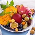 Exotic fruits on white plate Royalty Free Stock Photo