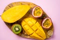 Exotic fruits on wooden cutting board Royalty Free Stock Photo