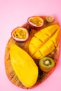 Exotic fruits on wooden cutting board Royalty Free Stock Photo