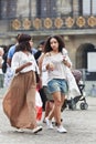 Exotic girls on the Amsterdam Dam Square