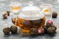 Exotic green tea glass teapot Royalty Free Stock Photo