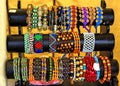 Exotic and loom bracelets on a stand