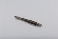 Exotic, Luxury Iroko wood bolt-action pen with chrome metal fixtures and beautiful knot in the wood - Product Photo