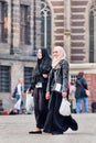 Exotic Muslim girl on the Dam Square, Amsterdam, Netherlands