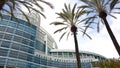 Exotic palm trees frame exterior of Anaheim Convention Center