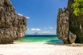 Beach between tall rocks