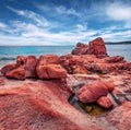 Exotic Red Rocks Gli Scogli Rossi - Faraglioni cliffs on Di Cea beach.