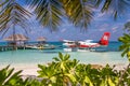 05.06.2018 - Ari Atoll, Maldives: Exotic scene with seaplane on Maldives sea landing. Vacation or holiday in Maldives concept