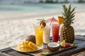 Exotic summer drinks with sandy beach backdrop Royalty Free Stock Photo