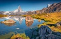 Exotic summer scene of Stellisee lake. Royalty Free Stock Photo