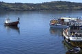 traditional wooden facade houses on stilts (palafitos) with fishermen boats in Castro, Isla de Chiloe, Patagonia, Chile Royalty Free Stock Photo