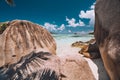 Exotic tropical Anse Source d`Argent beach with granite boulders on island La Digue at Seychelles