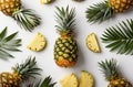 Exotic Tropical Delight: Sliced Pineapple and Green Leaves Pattern on White Background. Royalty Free Stock Photo