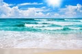 Exotic tropical paradise island beach, turquoise sea water, ocean waves, sand, sun, blue sky white clouds, beautiful tropic nature Royalty Free Stock Photo