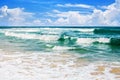 Exotic tropical paradise island beach, turquoise sea water, ocean waves, sand, sun, blue sky white clouds, beautiful tropic nature Royalty Free Stock Photo