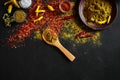 Exotically Spice Mix - spice, herbs, powder top view over dark background. Cooking and spicy food concept. Copy space Royalty Free Stock Photo