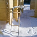 Expandable ladder on the snow