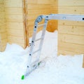 Expandable ladder on the snow