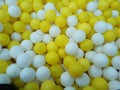 expanse of yellow and white balls