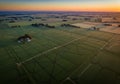 Expansive aerial view of green crop fields at sunset in Argentina. Royalty Free Stock Photo