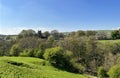 Rural landscape, with rolling hills and a distant church in, Cowling, UK