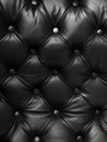 Expansive tufted black leather surface with a plush and inviting texture, creating a sense of luxury and sophistication. Royalty Free Stock Photo