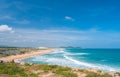 Expansive view of scenic tropical bay, Bai Mon gorgeous golden beach sand dunes blue waving sea. The easternmost coast in Vietnam