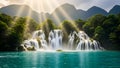 Expansive Waterfall with Multiple Cascades into a Bright Turquoise Lake Royalty Free Stock Photo