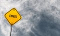 Expats - yellow sign with cloudy sky Royalty Free Stock Photo