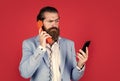 Expect the Best. Evolution of communication devices. Retro man talking on phone. Modern mobile phone and old vintage Royalty Free Stock Photo