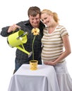 Expectant couple and flower Royalty Free Stock Photo